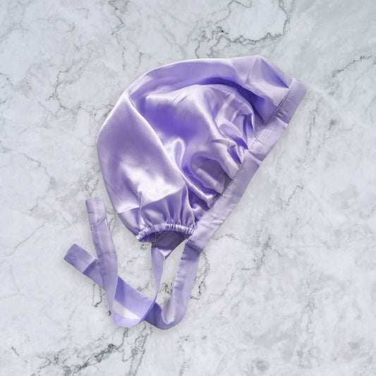 Silk_bonnet_with_ties_lilac_side_view