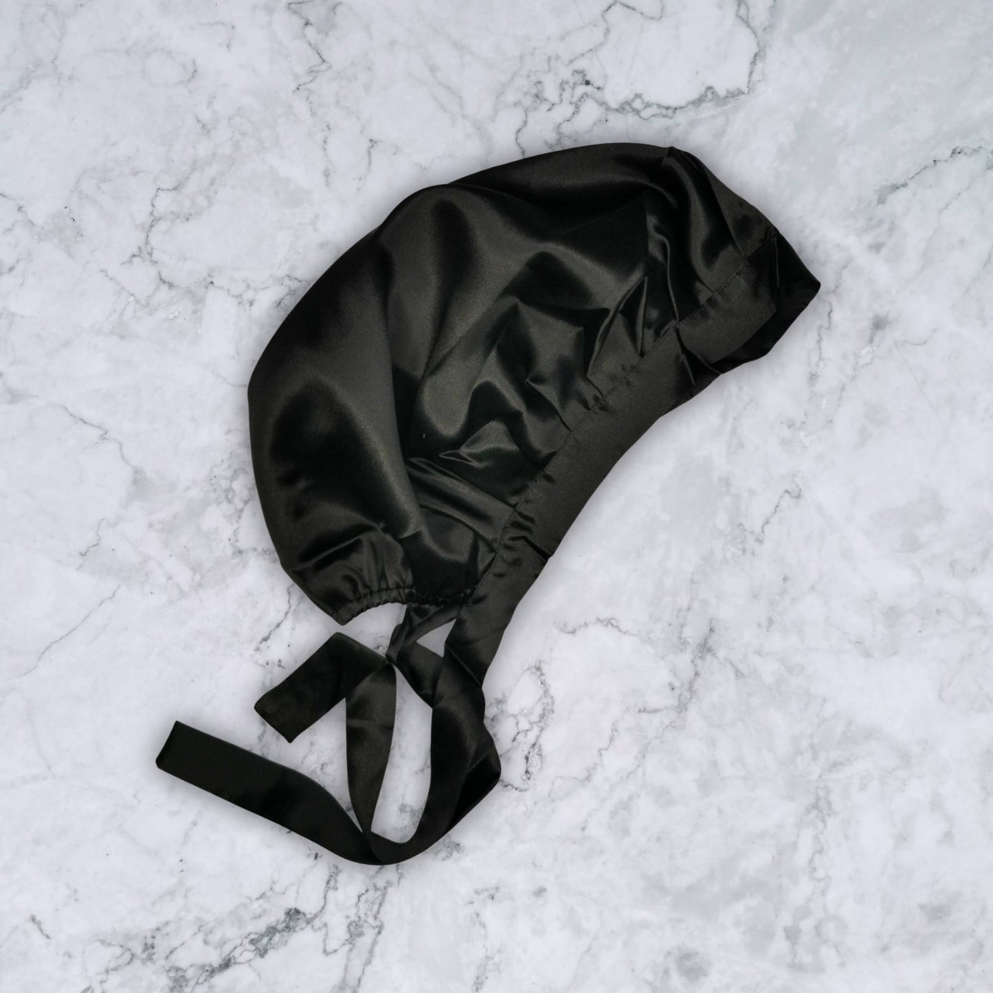 SILK HAIR WRAP FOR SLEEPING - BLACK SILK BONNET WITH TIES SIDE VIEW