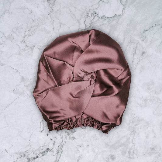 SILK HAIR WRAP WITH TWIST DETAIL - SILK TURBAN IN MAUVE TAUPE  FRONT VIEW