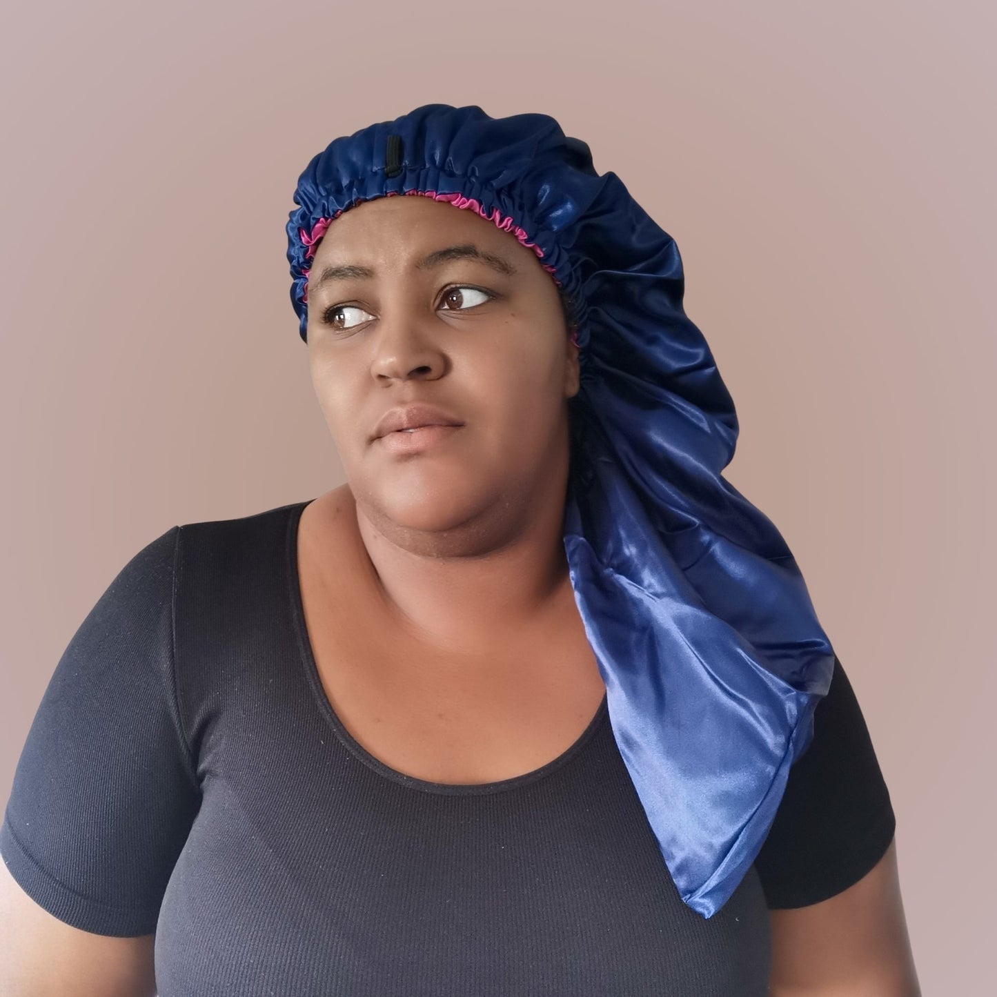 navy blue long satin bonnet with hot pink lining - model view