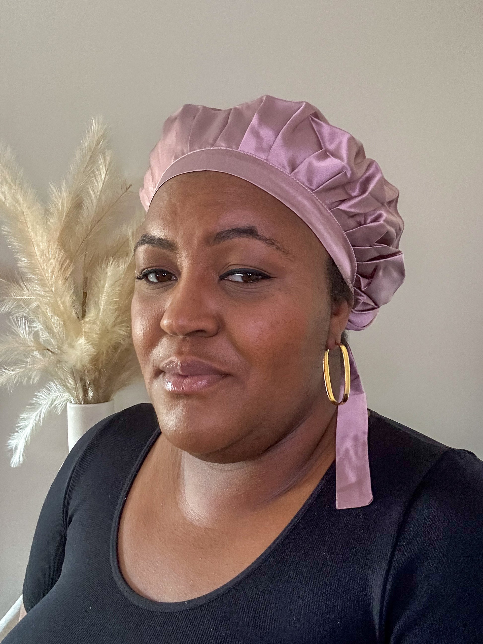 silk bonnet with ties - pale mauve colour worn by black female model