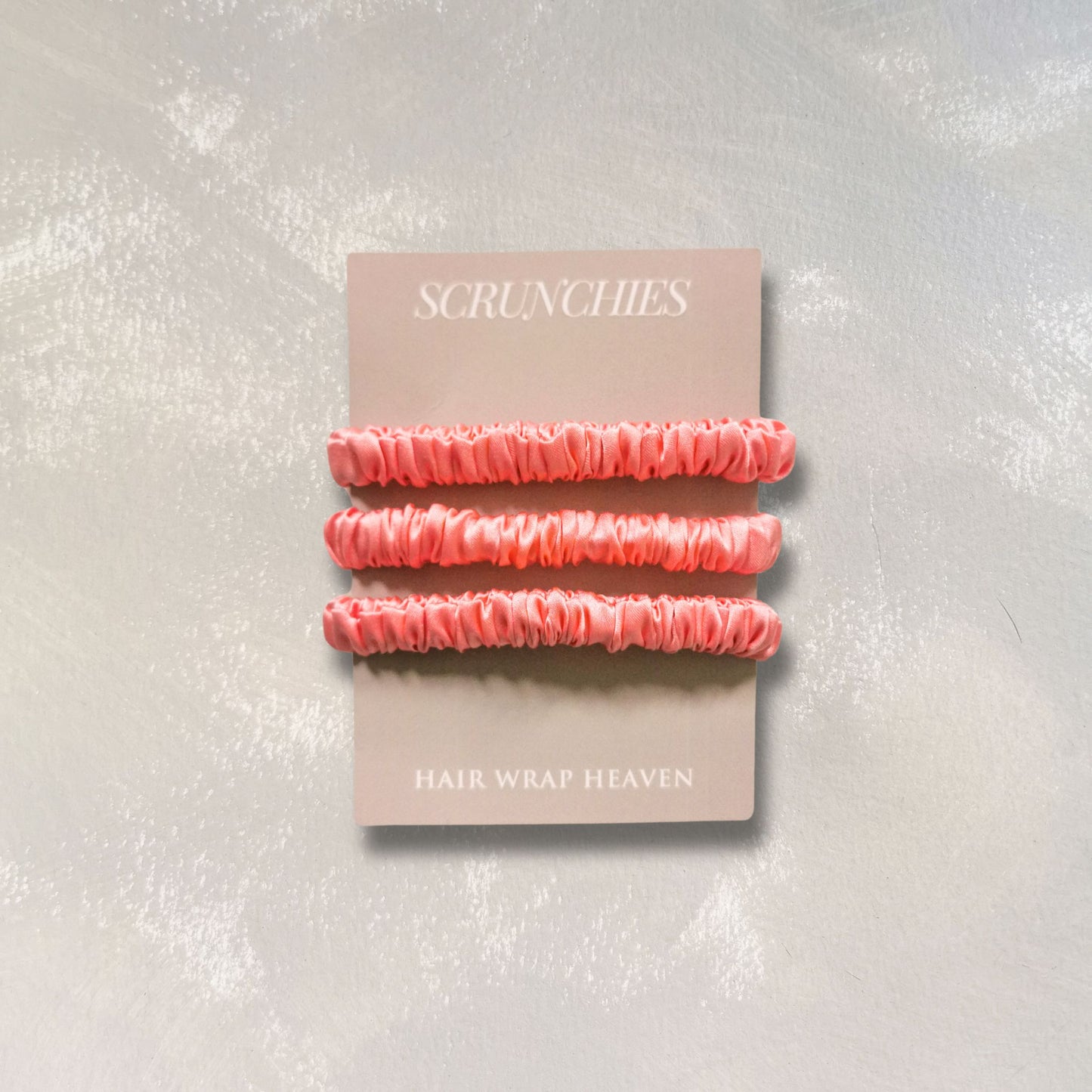 Coral_skinny_silk_scrunchies_from_Hair_Wrap_Heaven