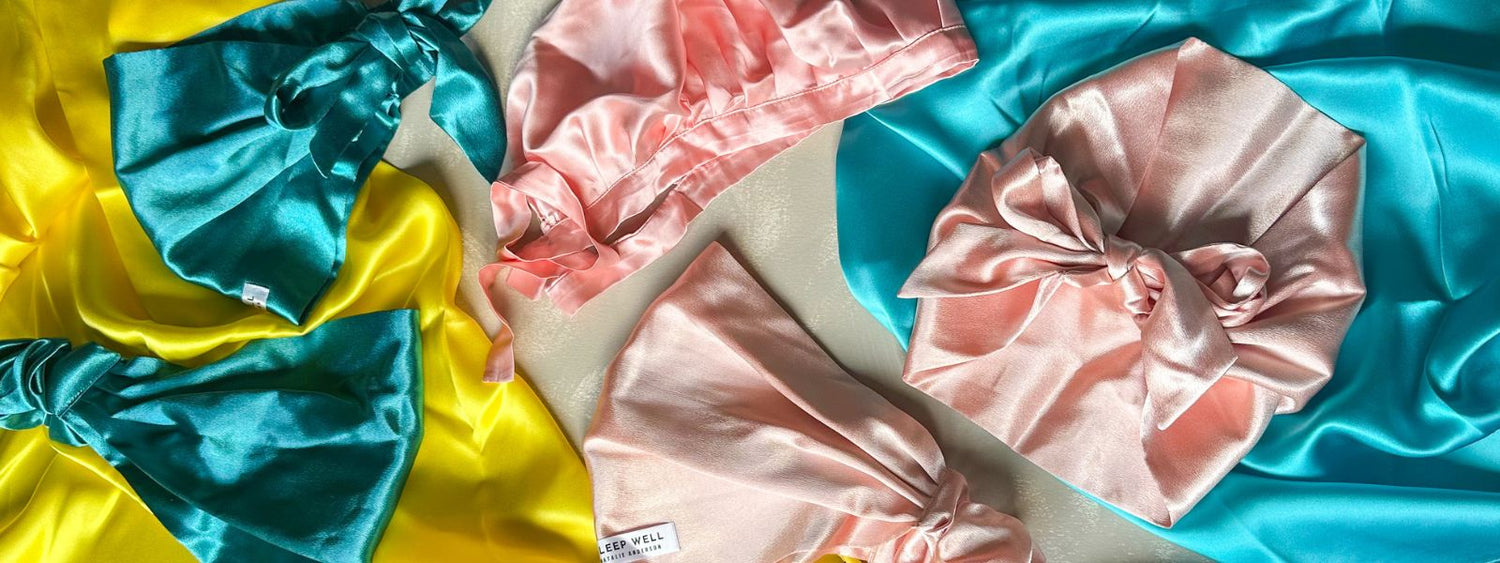 Colourful silk scarves with pink satin headbands and silk bonnet