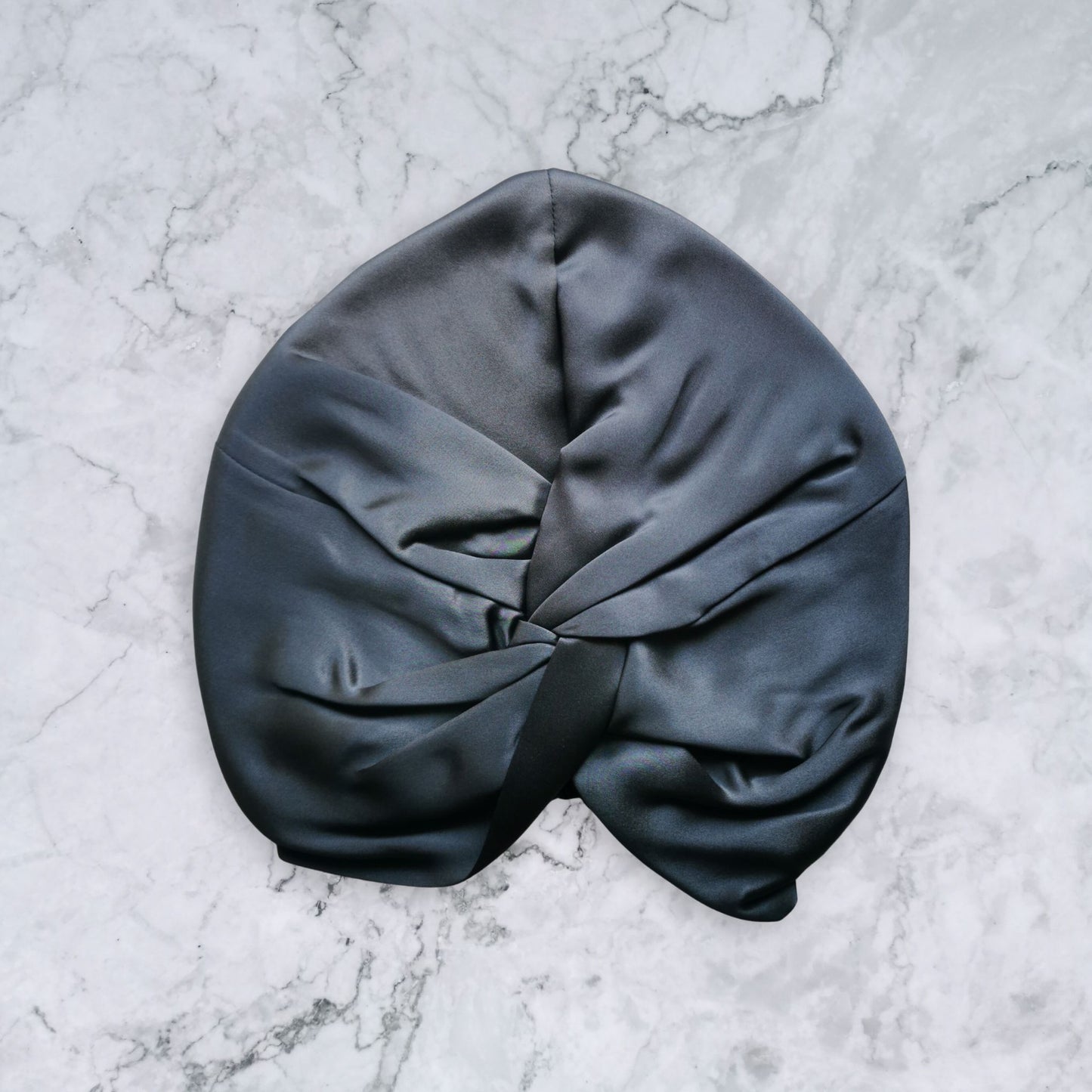 silk bonnet with twist detail to front elastic to back - dark charcoal grey front view