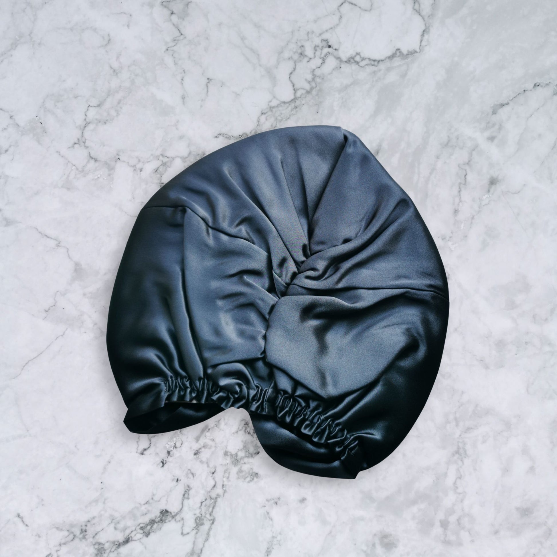 silk bonnet with twist detail to front elastic to back - dark charcoal grey back view