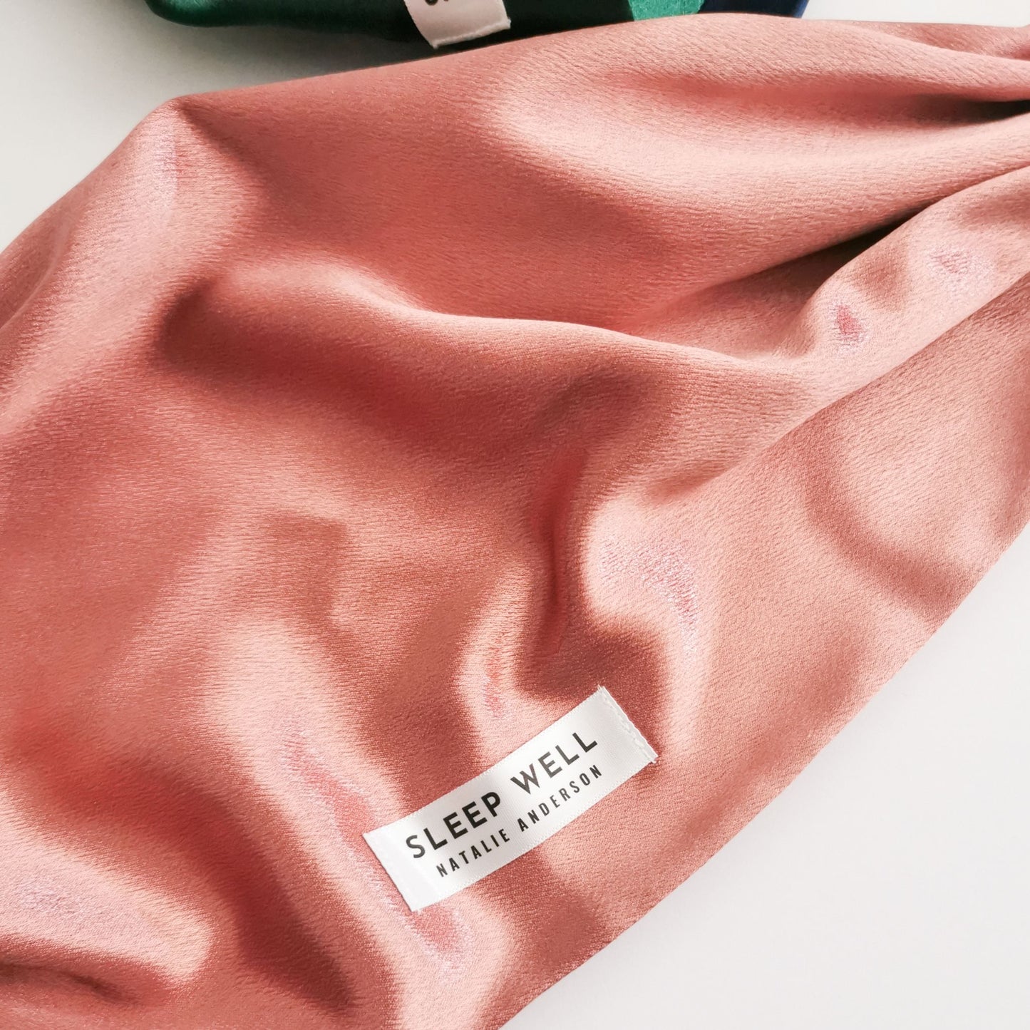 rose gold colour satin hair wrap with sleep well label