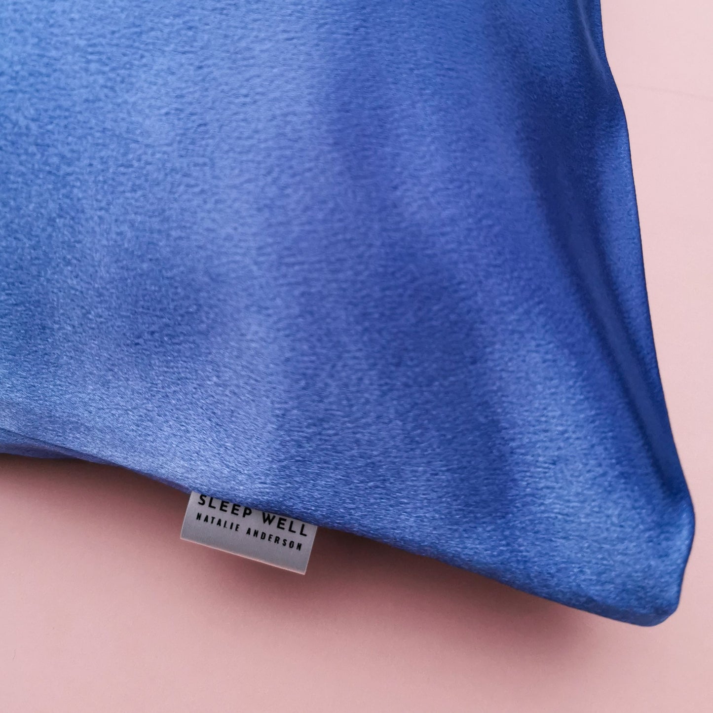 SLEEP WELL cornflower blue satin vegan silk pillowcase label close up